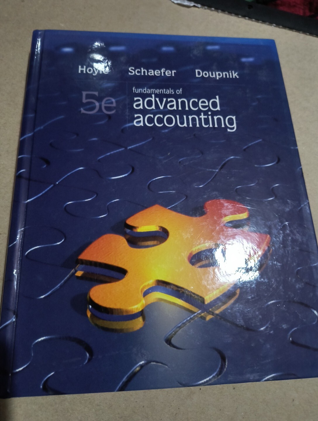 Fundamentals of Advanced Accounting by Joe Ben Hoyle, Timothy Doupnik and Thomas