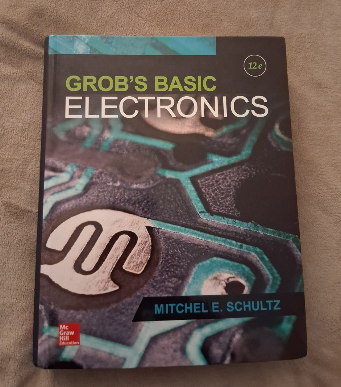 Grob’s Basic Electronics – Hardcover, by Schultz Mitchel 12e Edition – Very Good