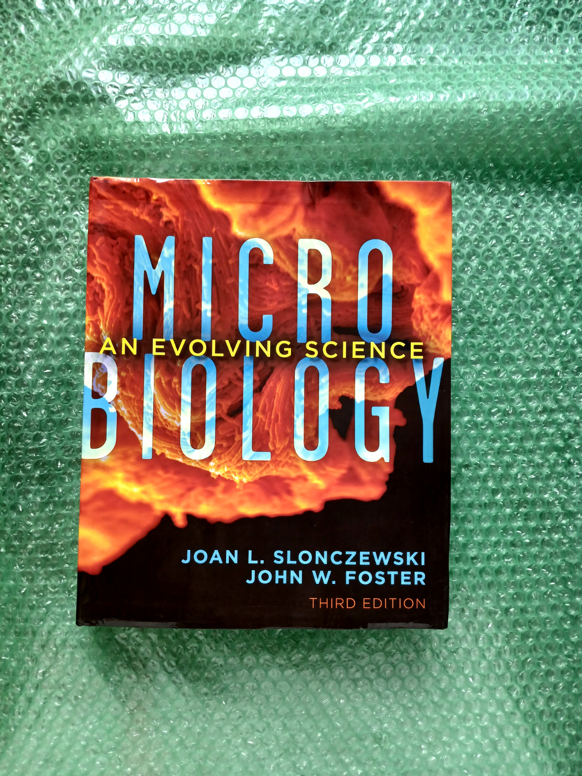 Microbiology : An Evolving Science by John W. Foster and Joan L. Slonczewski…